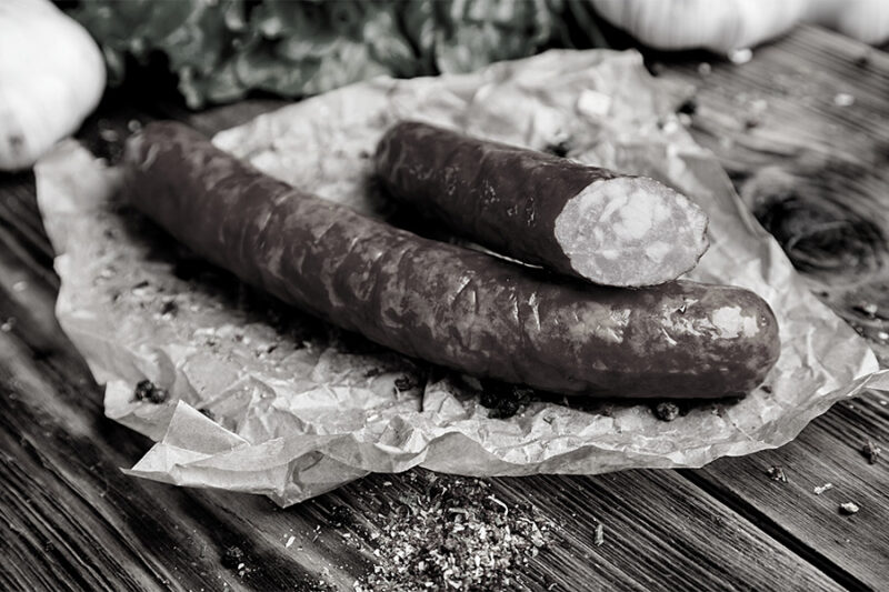 Treberwurst-Essen im Kraftakt Bistro